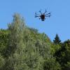 Drone équipé d'une caméra LiDAR en cours d'opération Drone équipé d'une caméra LiDAR en cours d'opération