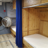 Une des chambres du module de confinement Une des chambres du module de confinement